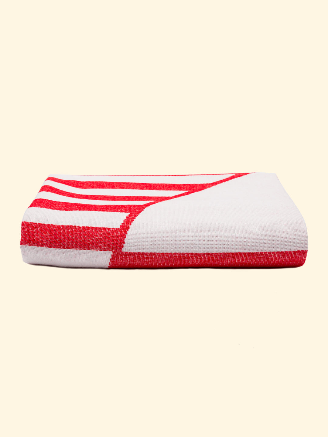 Model “Crassa” of Tucca light beach towel 100% organic cotton, perfectly folded as presented on the packaging. Showing that is a very thing beach towel easy to carry.