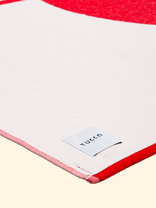 Model “Crassa” of Tucca light beach towel showing the top side. Completely flat to get a super thin beach towel